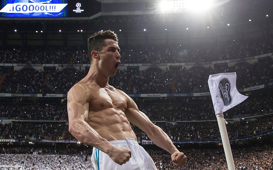 epa06662451 Real Madrid's Cristiano Ronaldo (R) celebrates next to Lucas Vazquez (L) after scoring the 1-3 during the UEFA Champions League quarter final, second leg soccer match between Real Madrid a ...