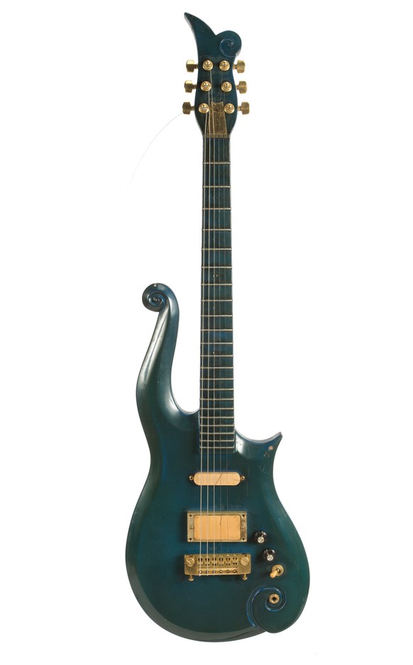 An undated photo provided by Julien’s Auctions shows Prince's teal blue Cloud guitar. Julien's Live auction house, based in Los Angeles, says the guitar that Prince used in the late 1980s and into the ...