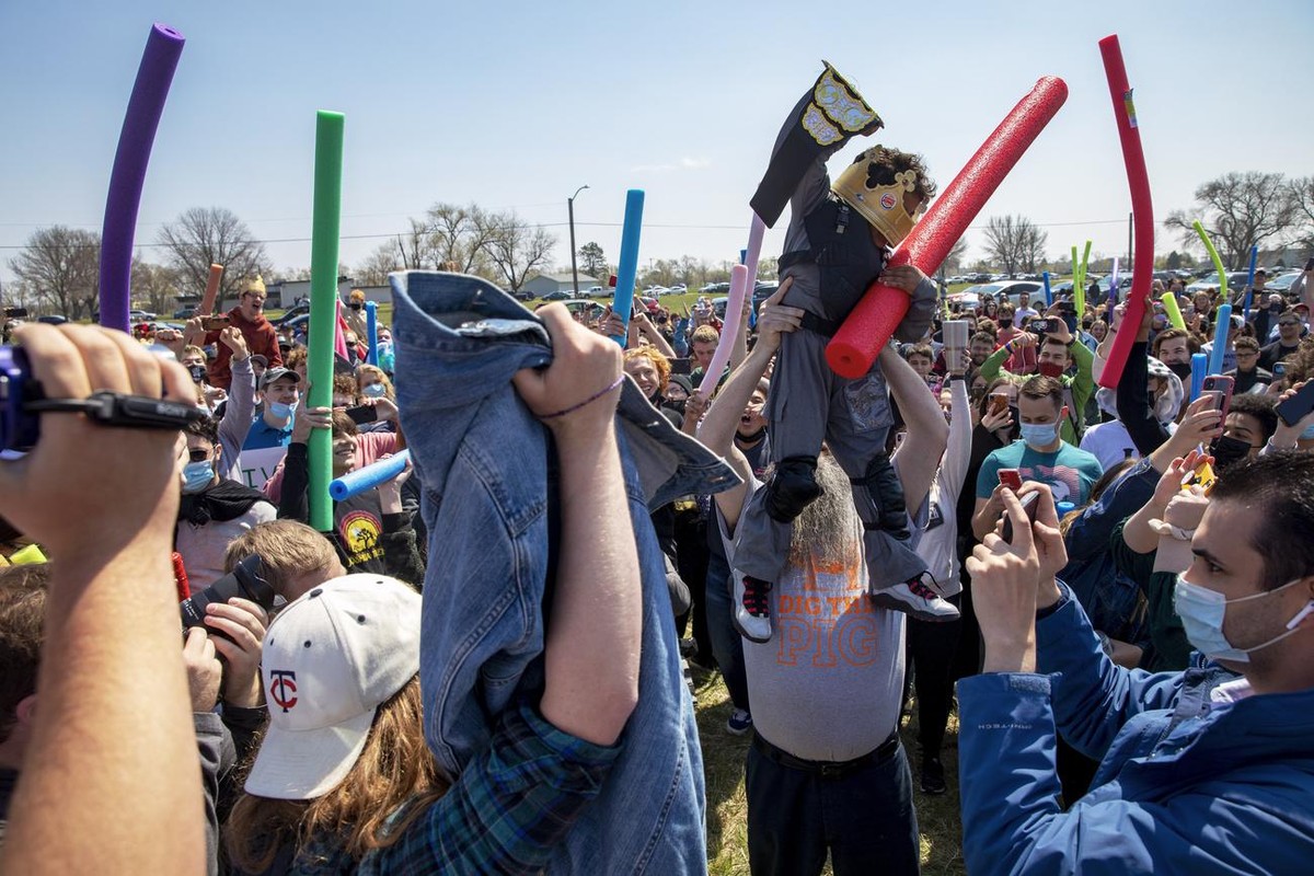 Lincoln native four-year-old Joshua Vinson Jr., top right, is lifted into the air after being declared the ultimate Josh after the Josh fight took place in an open green space at Air Park on Saturday, ...