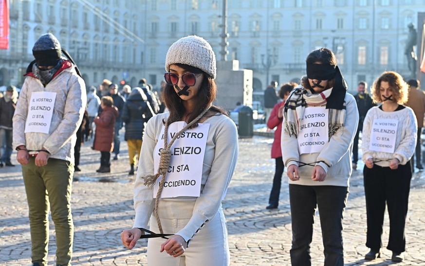 epa10370520 People take part in a demonstration against the Iranian regime organized by the Iranian community, in Turin, Italy, December 17, 2022, following Iran's death sentence and public execution of t...