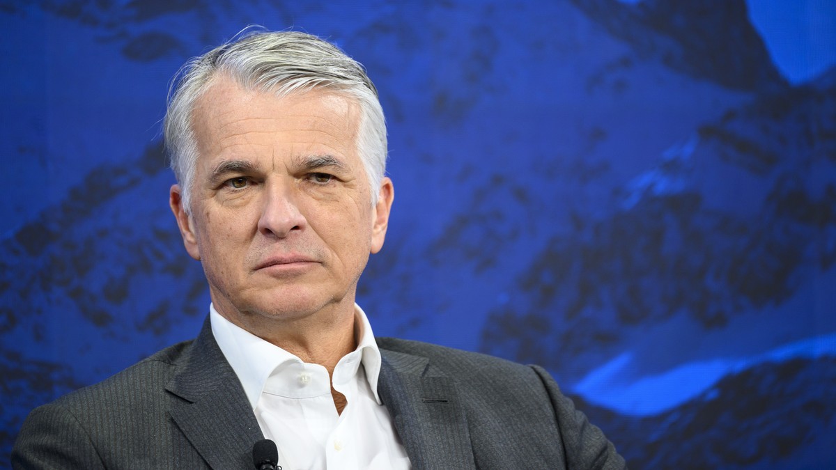 epa11084861 Swiss Bank UBS Group Chief Executive Officer Sergio Ermotti looks on during a panel session of the 54th annual meeting of the World Economic Forum (WEF), in Davos, Switzerland, 17 January  ...