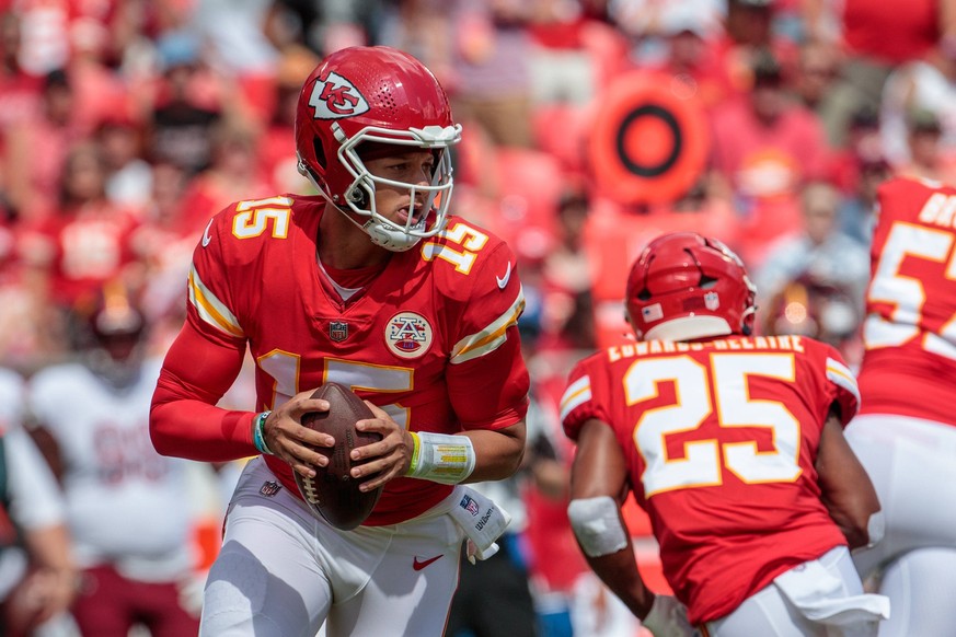 KANSAS CITY, MO - AUGUST 20: Kansas City Chiefs quarterback Patrick Mahomes 15 scrambles during the game against the Washington Commanders on August 20th, 2022 at GEHA field Arrowhead Stadium in Kansa ...