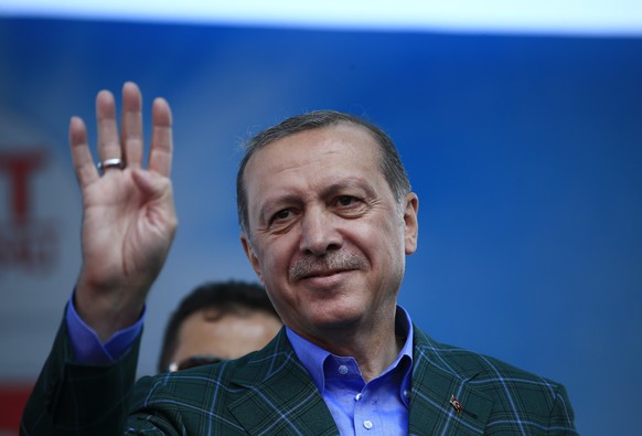FILE - In this Saturday, April 15, 2017 photo, Turkey's President Recep Tayyip Erdogan waves to supporters during the last rally ahead of Sunday's referendum, in Istanbul. Few men can claim ...