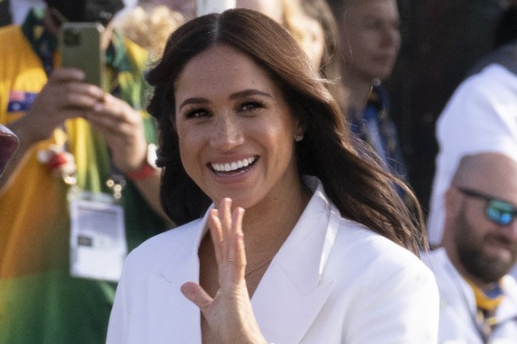 Meghan Markle, Duchess of Sussex, arrives at the Invictus Games venue in The Hague, Netherlands, Friday, April 15, 2022. The week-long games for active servicemen and veterans who are ill, injured or  ...
