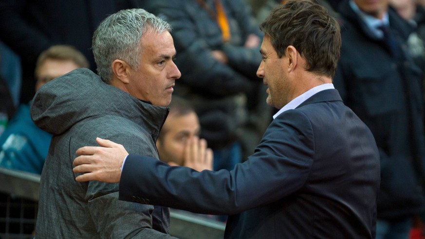 epa05918072 Manchester United manager Jose Mourinho (L) greets Anderlecht manager Rene Weiler during the UEFA Europa League quarter final, second leg soccer match between Manchester United and RSC And ...