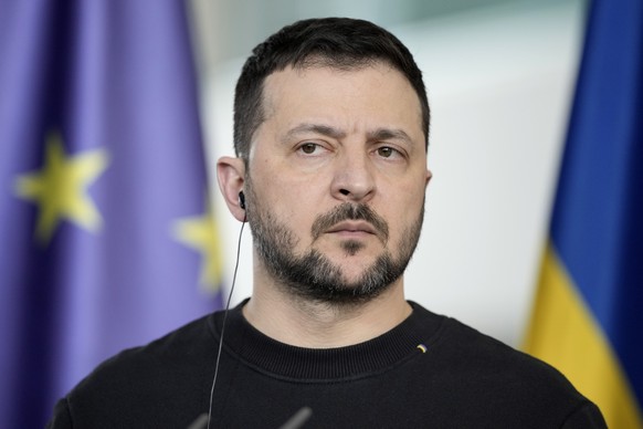 Ukrainian President Volodymyr Zelenskyy attends a joint press conference with German Chancellor Olaf Scholz in the chancellory in Berlin, Friday, Feb.16, 2024. (AP Photo/Markus Schreiber)