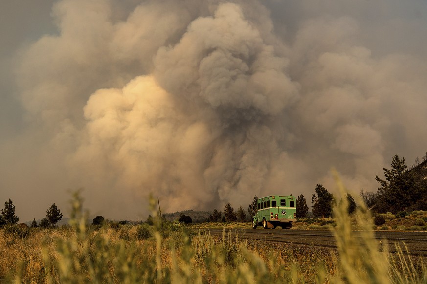 Smoke from the Lava Fire billows over Highway 97 in Weed, Calif., on Thursday, July 1, 2021. Firefighters are battling multiple fires in the region following high temperatures and lightning strikes. ( ...