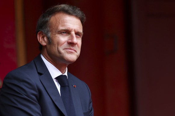 epa12136324 French President Emmanuel Macron attends a luncheon with Vietnam&#039;s Communist Party General Secretary To Lam (not pictured) at Van Mieu, in Hanoi, Vietnam, 26 May 2025. EPA/Chalinee Th ...