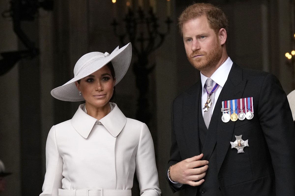 FILE - Prince Harry and Meghan Markle, Duke and Duchess of Sussex leave after a service of thanksgiving for the reign of Queen Elizabeth II at St Paul's Cathedral in London, Friday, June 3, 2022. ...