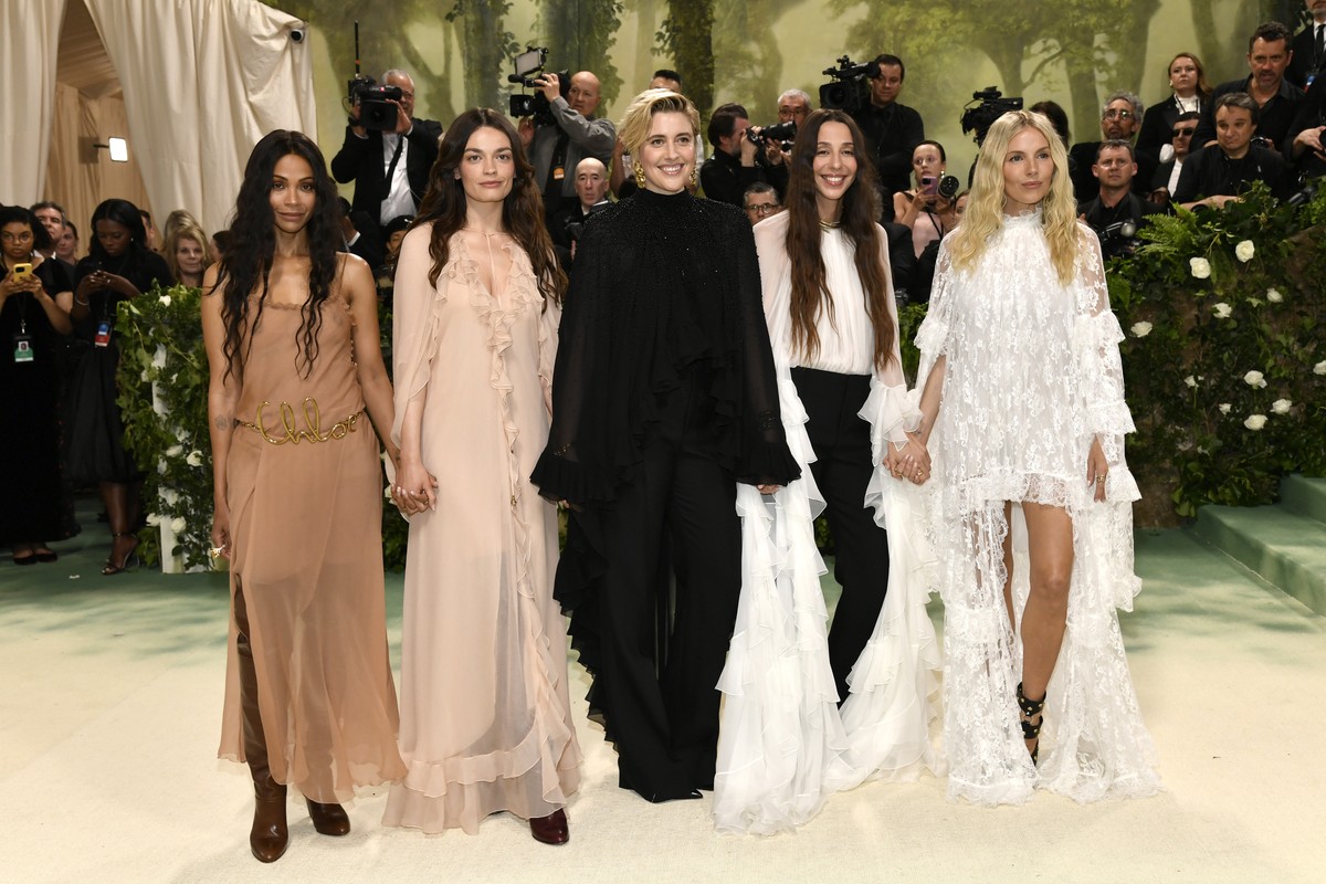 Zoe Saldana, from left, Emma Mackey, Greta Gerwig, Chemena Kamali and Sienna Miller attend The Metropolitan Museum of Art's Costume Institute benefit gala celebrating the opening of the "Sle ...
