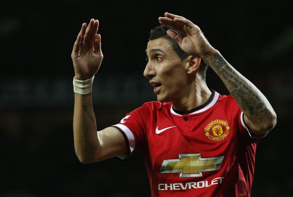 Manchester United’s Angel Di Maria holds his hands to his head after missing a chance to score a goal during the English FA Cup quarterfinal soccer match between Manchester United and Arsenal at Old T ...
