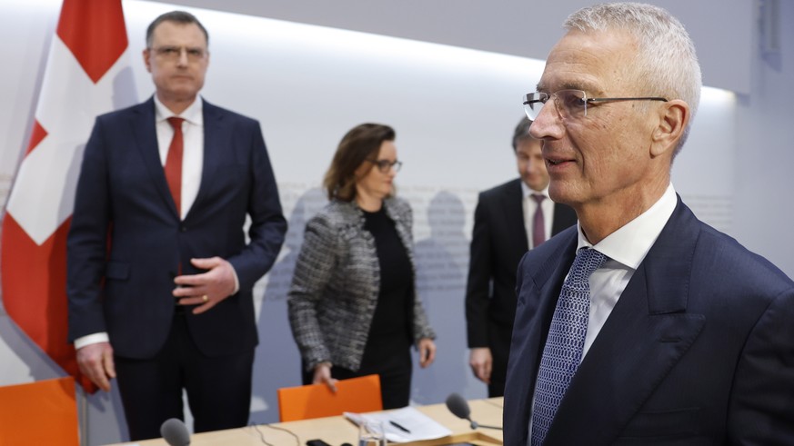 epa10532649 Axel Lehmann, Chairman Credit Suisse (R), Thomas J. Jordan (L), Chairman Swiss National Bank, and Marlene Amstad (C), President FINMA, attend a press conference in Bern, Switzerland, 19 Ma ...