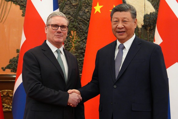 British Prime Minister Keir Starmer, left, shakes hands with Chinese President Xi Jinping ahead of a meeting in Beijing Thursday, Jan. 29, 2026. (Carl Court/Pool Photo via AP)
Keir Starmer,Xi Jinping