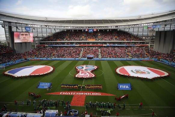 Players of France and Peru line up before for the start of the group C match between France and Peru at the 2018 soccer World Cup in the Yekaterinburg Arena in Yekaterinburg, Russia, Thursday, June 21 ...