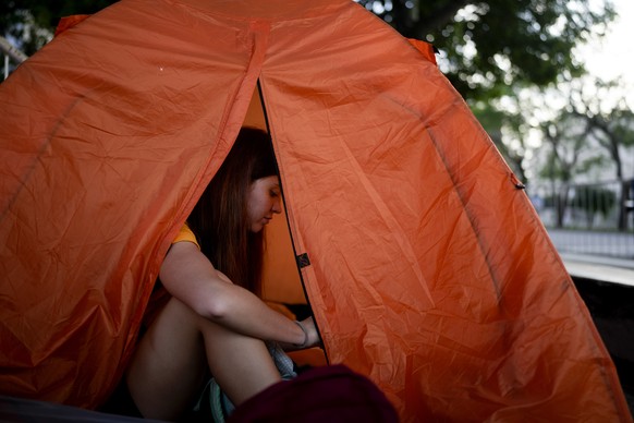 A fan of Taylor Swift camps outside Monumental stadium to secure a front-row spot for the next day&#039;s Eras Tour concert in Buenos Aires, Argentina, Wednesday, Nov. 8, 2023. (AP Photo/Natacha Pisar ...