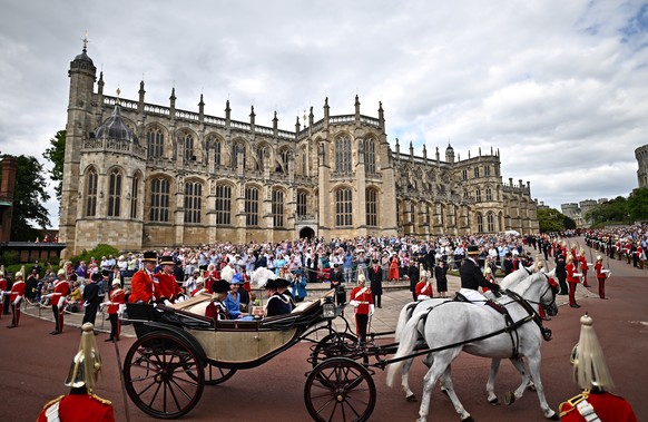 Britain&#039;s Prince Charles, Camilla, Duchess of Cornwall, Prince William and Kate, Duchess of Cambridge, leave after the Order of the Garter service at Windsor Castle, in Windsor, England, Monday,  ...