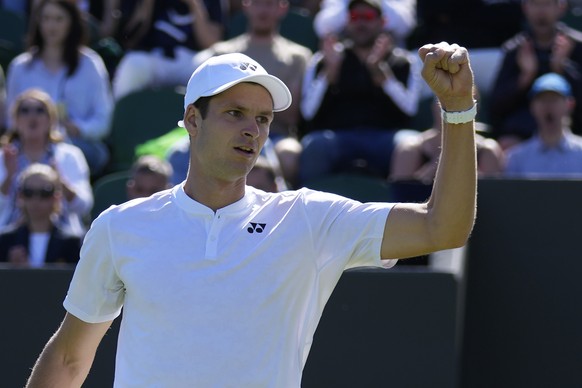 Poland&#039;s Hubert Hurkacz celebrates winning a point against Spain&#039;s Alejandro Davidovich Fokina during their men&#039;s singles tennis match on day one of the Wimbledon tennis championships i ...