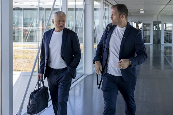 Basel&#039;s scout Ruedi Zbinden, left, and sports diector Daniel Stucki, right, upon their departure the day before the UEFA Champions League play-off second leg match between Denmark&#039;s F.C. Cop ...