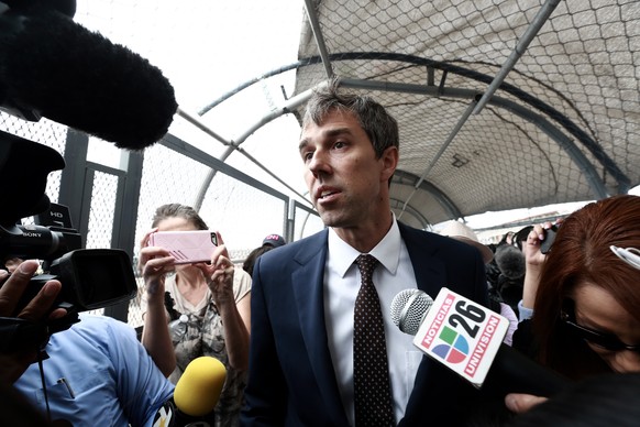 Democratic presidential candidate Beto O&#039;Rourke is surrounded by reporters as he walks on an international bridge to cross into Ciudad Juarez, Mexico, Thursday, Aug. 8, 2019. OÄôRourke has cross ...
