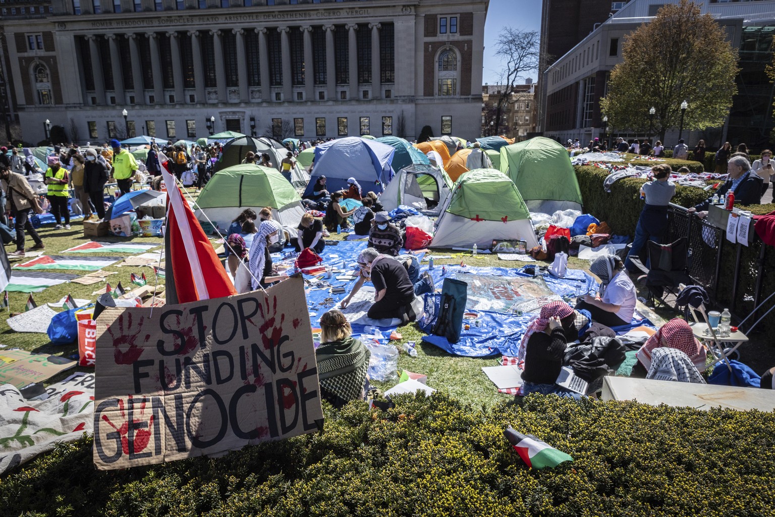 A sign sits erected at the pro-Palestinian demonstration encampment at Columbia University in New York, Monday, April 22, 2024. U.S. colleges and universities are preparing for end-of-year commencemen ...