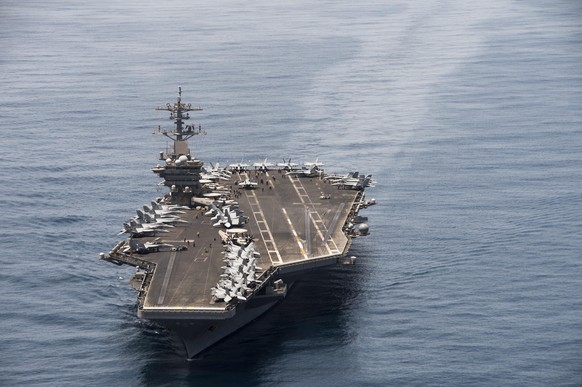 epa08335876 (FILE) - An aerial handout image made available by US Navy showing the aircraft carrier USS Theodore Roosevelt (CVN 71) operating in the Arabian Sea on 21 April 2015 (reissued 01 April 202 ...