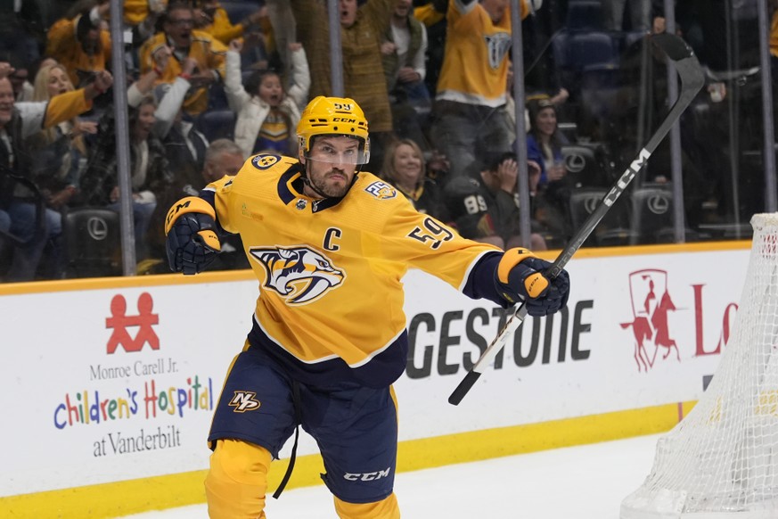 Nashville Predators defenseman Roman Josi (59) celebrates his game winning goal at the end of overtime of an NHL hockey game against the Vegas Golden Knights, Tuesday, March 26, 2024, in Nashville, Te ...