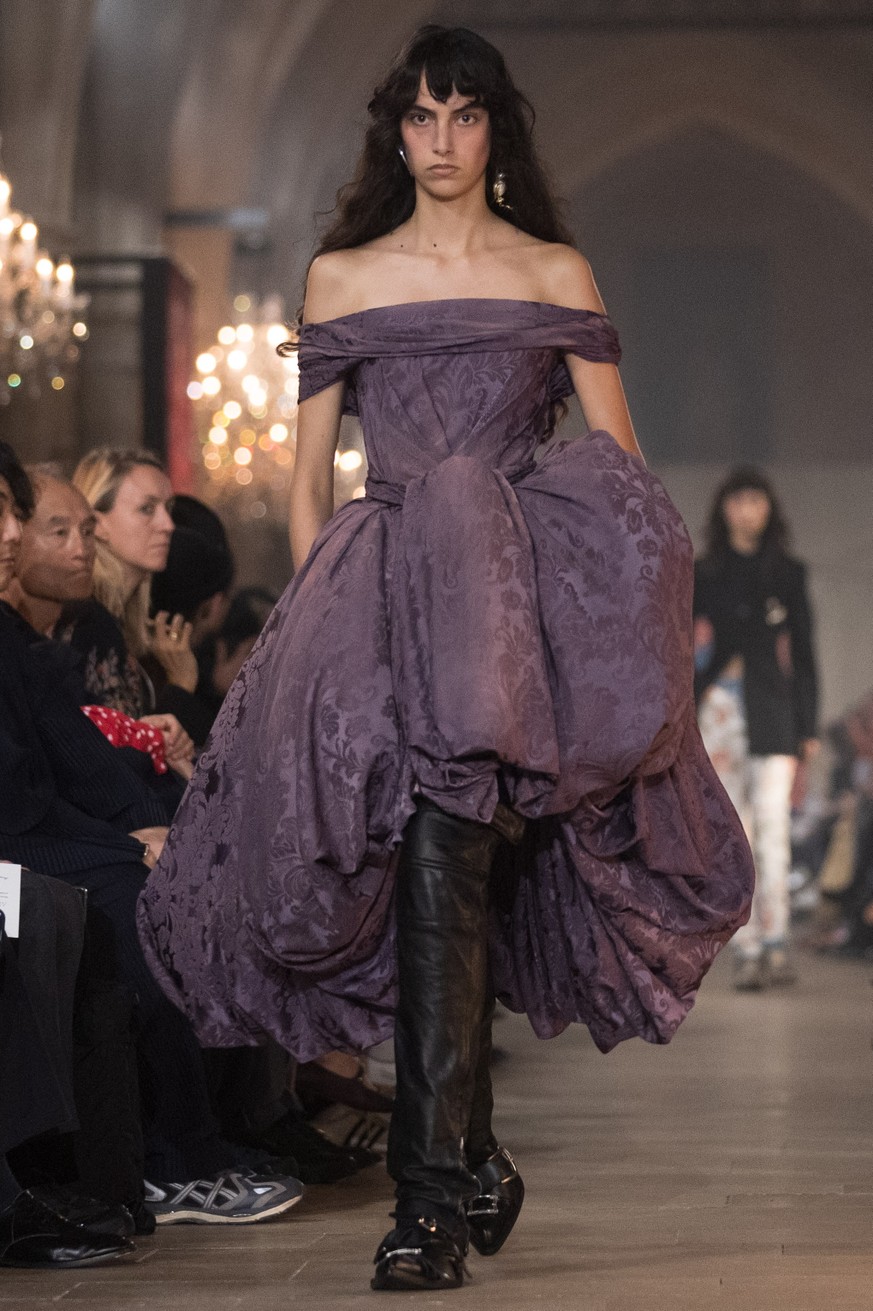 epa13273429 A model presents a creation from the Spring/Summer 2027 collection by Acne Studios fashion house during Paris Fashion Week, in Paris, France, 30 September 2026. The presentation of Paris F ...