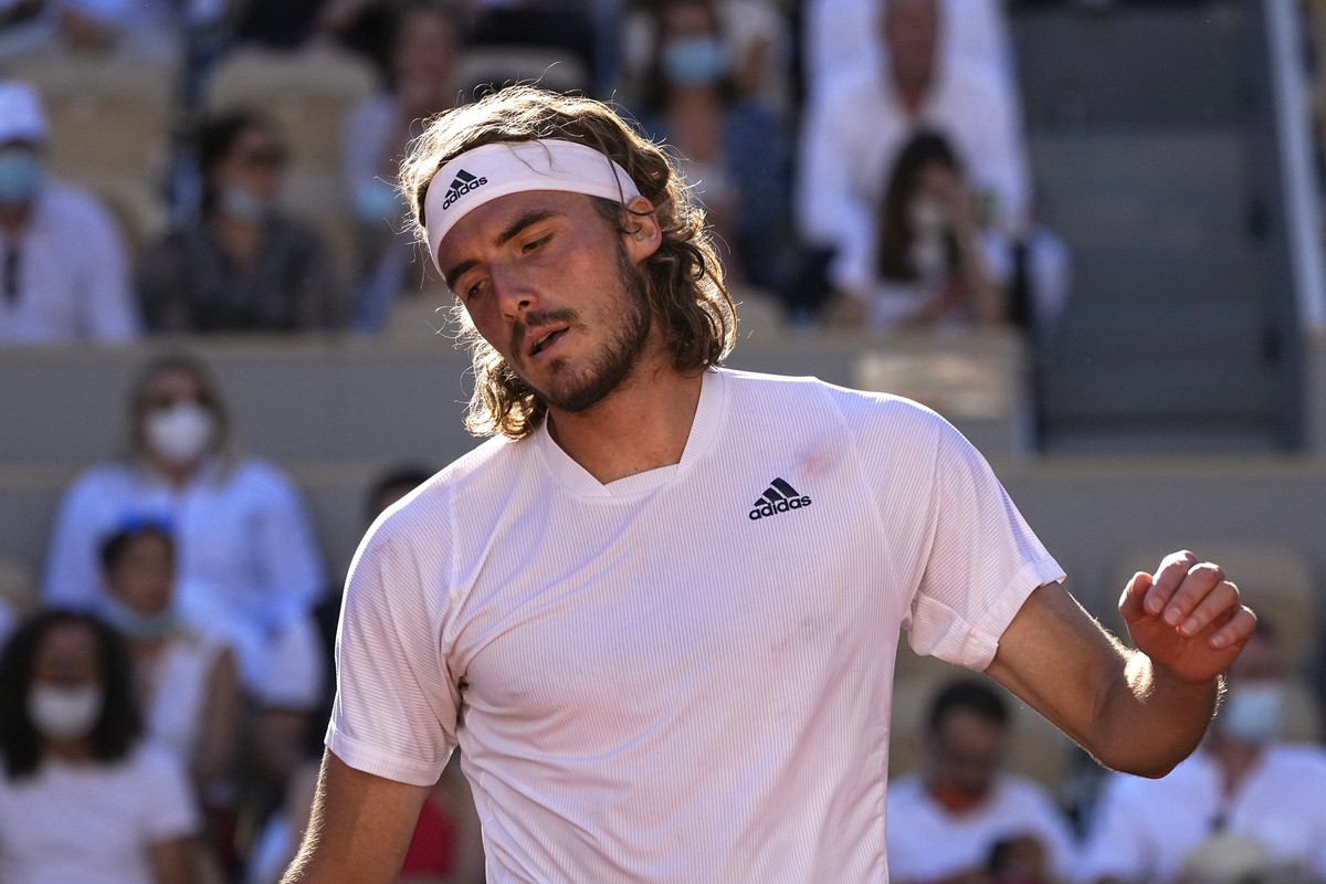Stefanos Tsitsipas of Greece reacts as he plays Serbia's Novak Djokovic during their final match of the French Open tennis tournament at the Roland Garros stadium Sunday, June 13, 2021 in Paris.  ...