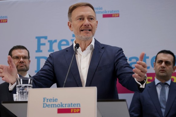 BERLIN, GERMANY - NOVEMBER 07: Christian Lindner, leader of the Free Democratic Party (FDP), is flanked by outgoing Justice Minister Marco Buschmann (L) and FDP Secretary General Bijan Djir-Sarai as h ...
