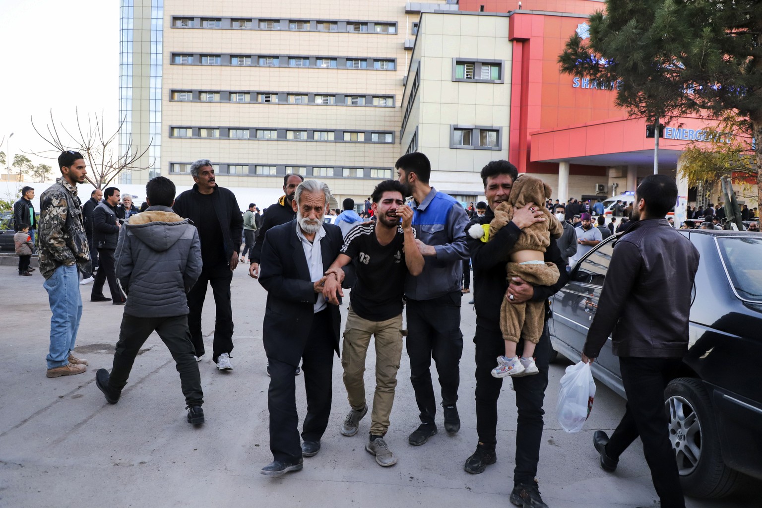 Families of victims of the explosions gather at the courtyard of a hospital in the city of Kerman, about 510 miles (820 kilometres) southeast of the capital Tehran, Iran, Wednesday, Jan. 3, 2024. Two  ...