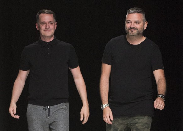 epa04959633 US designer Johnny Talbot (L) and German designer Adrian Runhof (R) take to the catwalk to thank the audience after their Spring/Summer 2016 Ready to Wear collection show for their label T ...