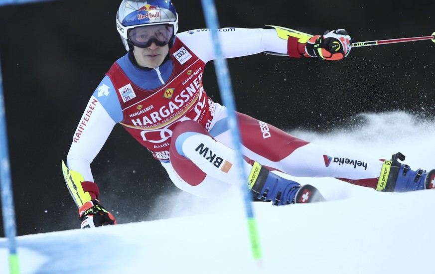 Switzerland&#039;s Marco Odermatt speeds down the course during an alpine ski, men&#039;s World Cup giant slalom, in Alta Badia, Italy, Sunday, Dec.19, 2021. (AP Photo/Gabriele Facciotti)