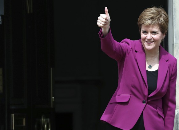 Scotland&#039;s First Minister and Scottish National Party leader Nicola Sturgeon poses for photographers, at Bute House in Edinburgh, Scotland. Sunday, May 9, 2021. British Prime Minister Boris Johns ...