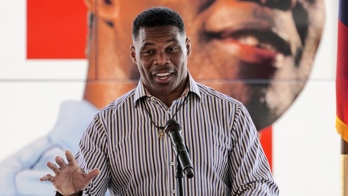FILE - Republican candidate for U.S. Senate Herschel Walker speaks during a campaign stop in Dawsonville, Ga., Oct. 25, 2022. A woman came forward Wednesday, Oct. 26, to accuse Walker of encouraging a ...