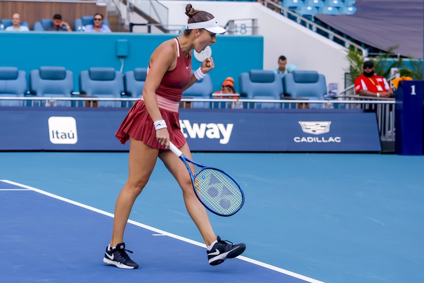 epa09859472 Belinda Bencic of Switzerland reacts against Daria Saville of Australia during a quarterfinal round match of the Miami Open tennis tournament at Hard Rock Stadium in Miami Gardens, Florida ...