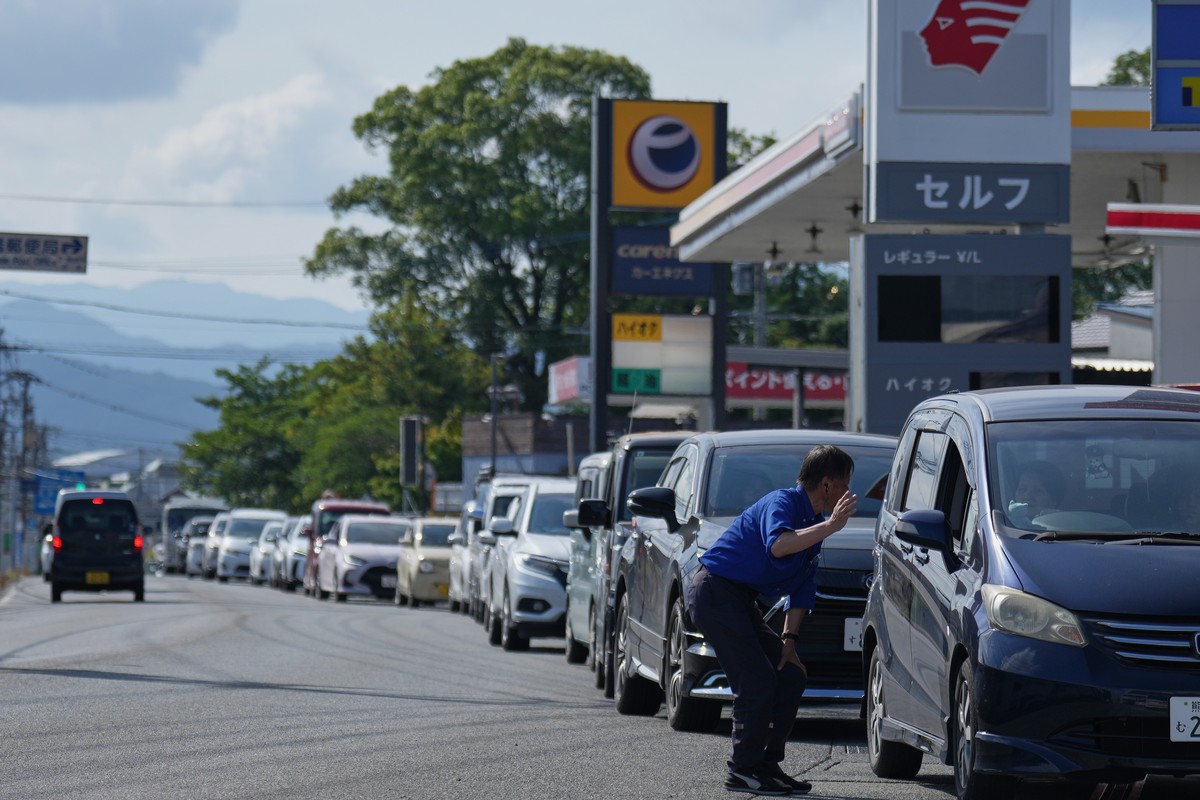 A long line of vehicles forms at a gas station as people seek fuel following an earthquake in Hikawa, Kumamoto Prefecture, southern Japan, Thursday, July 30, 2026. (AP Photo/Hiro Komae)
Japan Earthqua ...