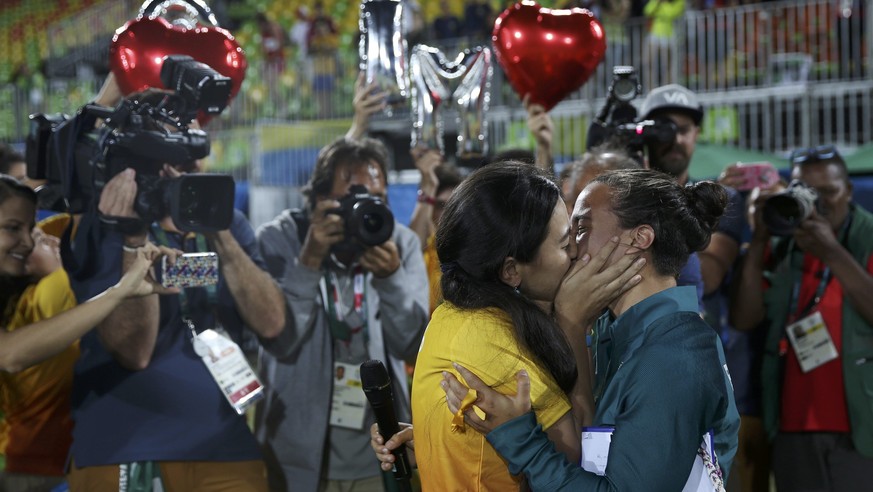 2016 Rio Olympics - Rugby - Women&#039;s Gold Medal Match Australia v New Zealand - Deodoro Stadium - Rio de Janeiro, Brazil - 08/08/2016. Rugby player Isadora Cerullo (BRA) of Brazil hugs Marjorie, a ...