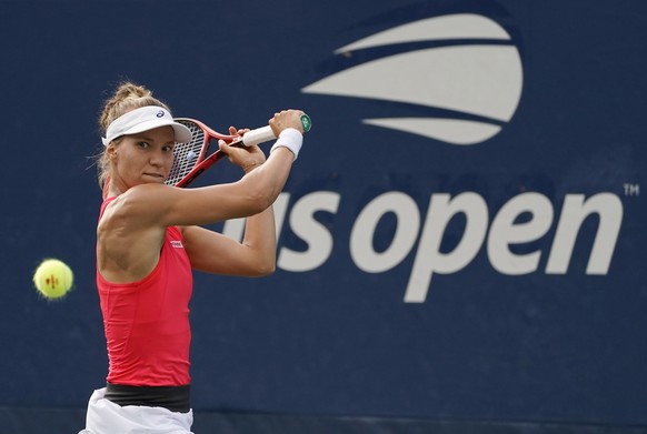 epa07796089 Viktorija Golubic of Switzerland hits a return to Shuai Zhang of China during their match on the first day of the US Open Tennis Championships the USTA National Tennis Center in Flushing M ...