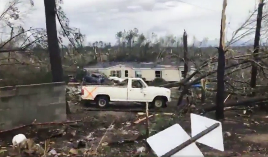 This photo shows debris in Lee County, Ala., after what appeared to be a tornado struck in the area Sunday, March 3, 2019. Severe storms destroyed mobile homes, snapped trees and left a trail of destr ...