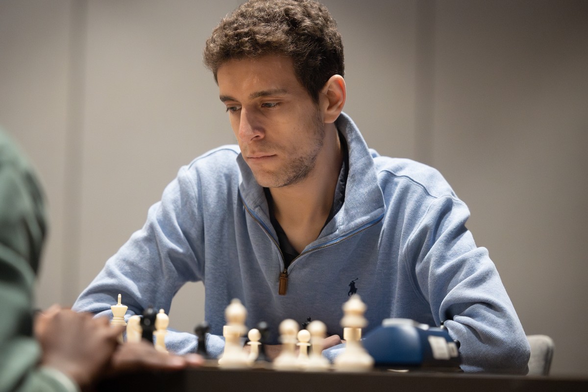 This undated photo released by Charlotte Chess Center shows Daniel Naroditsky playing chess on the board. (Kelly Centrelli/Charlotte Chess Center via AP
Obit Daniel Naroditsky