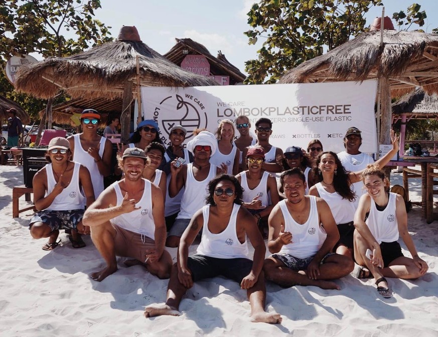 Risman (backmost row, third from right) and Anton (first row, third from right) want to ban the single-use plastic from their island.