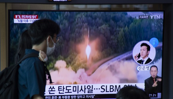 epa10204744 A man watchs the news at a station in Seoul, South Korea, 25 September 2022. According to South Korea's Joint Chiefs of Staff (JCS), North Korea fired a ballistic missile into the East Sea ...