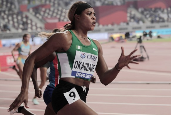 Blessing Okagbare, of Nigeria races in a women&#039;s 200 meter heat at the World Athletics Championships in Doha, Qatar, Sept. 30, 2019. U.S. prosecutors charged a Texas man on Wednesday, Jan. 12, 20 ...
