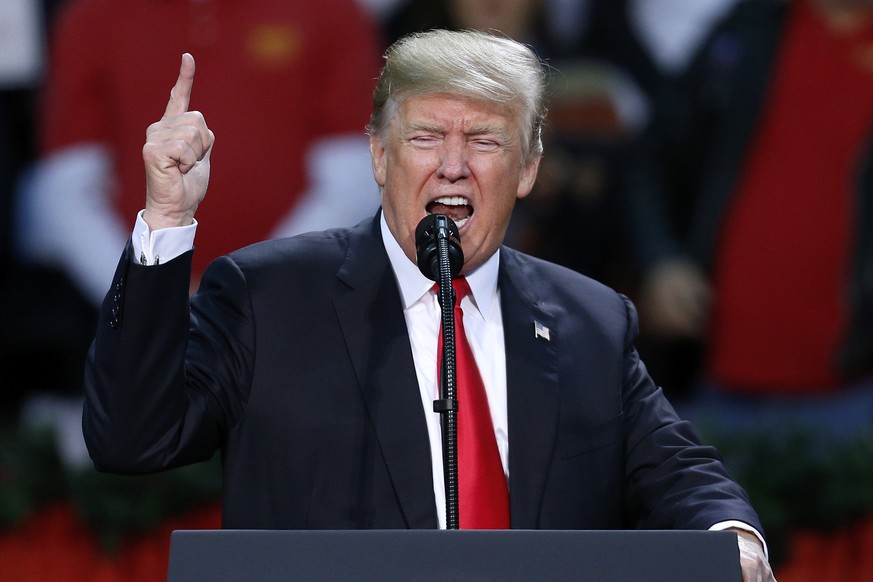 President Donald Trump speaks during a rally in Pensacola, Fla., Friday, Dec. 8, 2017. (AP Photo/Jonathan Bachman)