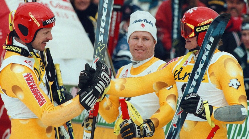 Erfolgreiche Schweizer im legendären Käsedress: Mike von Grünigen, Urs Kälin und Paul Accola (von links) 1998 in Adelboden.