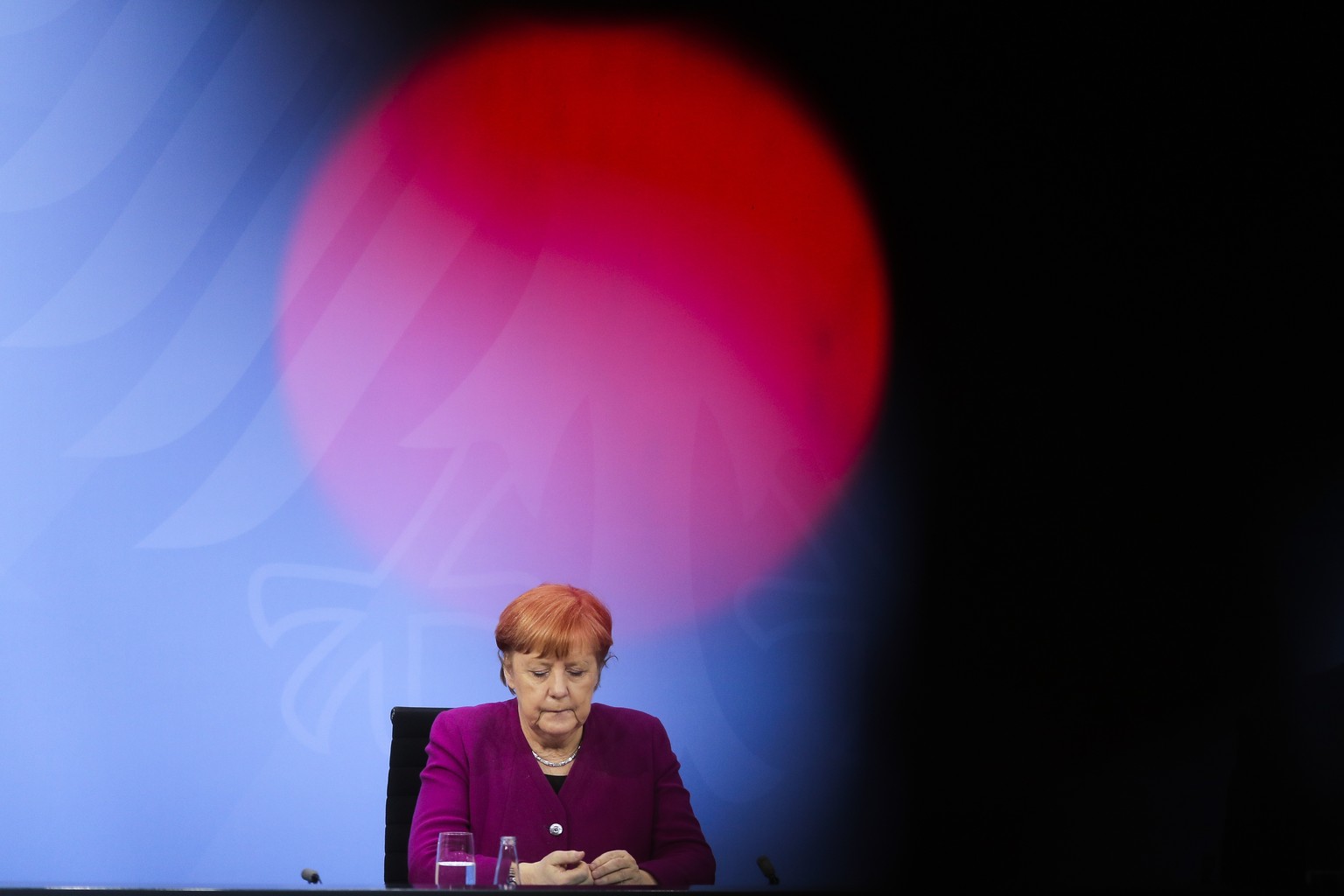 CORRECTS DAY - German Chancellor Angela Merkel attends a news conference with Bavarian state governor Markus Soeder and the Mayor of Berlin Michael Mueller after a meeting at the chancellery in Berlin ...