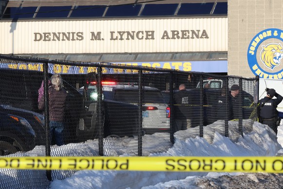 Police and ATF agents stand near the Lynch Arena in Pawtucket, R.I., after a shooting at the ice rink, Monday, Feb. 16, 2026. (AP Photo/Mark Stockwell)
Pawtucket Shooting