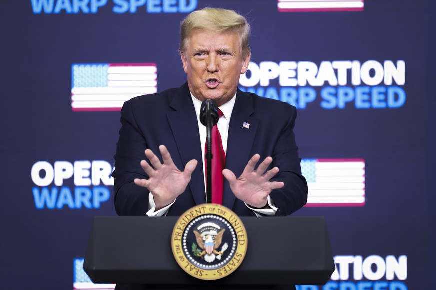 epa08871205 US President Donald J. Trump speaks during an Operation Warp Speed Vaccine Summit in the South Court Auditorium of the of the Eisenhower Executive Office Building at the White House in Was ...