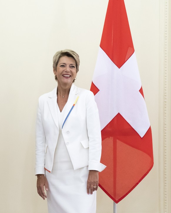 epa09420141 Swiss Federal Councillor Karin Keller-Sutter (R) and Austrian Interior Minister Karl Nehammer pose during a work visit in Bern, Switzerland, 19 August 2021. EPA/PETER KLAUNZER