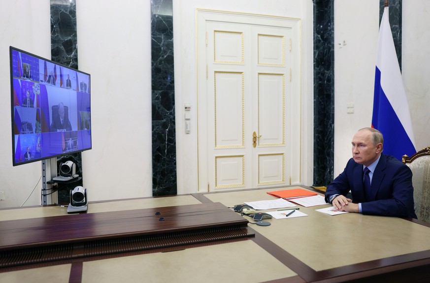 Russian President Vladimir Putin attends a Security Council meeting via videoconference in Moscow, Russia, Friday, Sept. 9, 2022. (Gavriil Grigorov, Sputnik, Kremlin Pool Photo via AP)